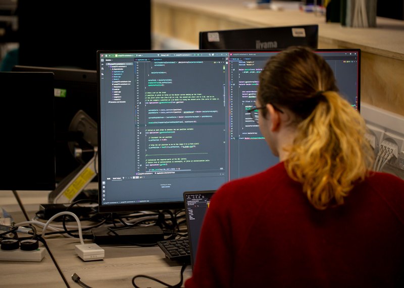 A girl in front of a computer in our games academy
