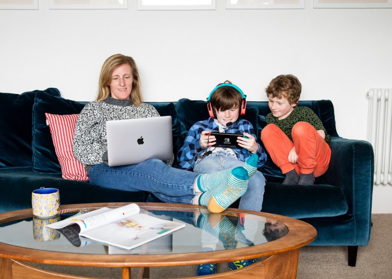 An online student working from their lounge