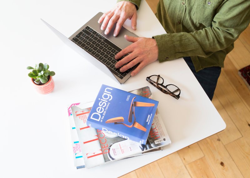 Interior Design online student working on laptop