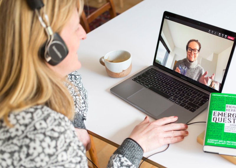 An online student talking to a course mate via video call