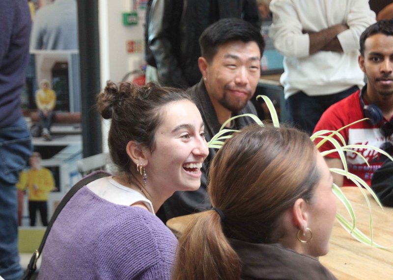 International students chatting at a table