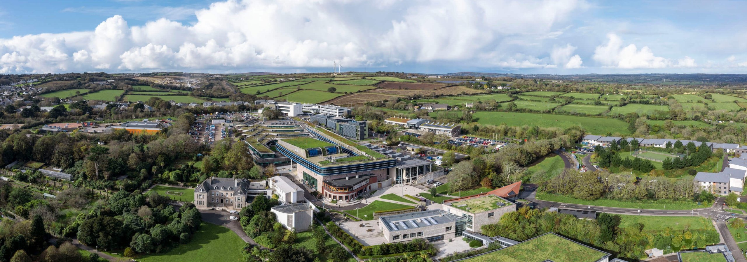 Panoramic view of Penryn Campus with buildings and trees