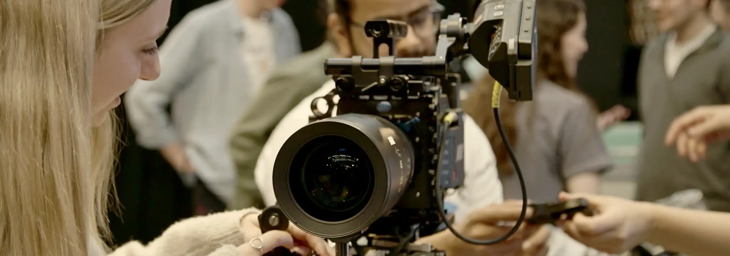 People using an ARRI camera as part of a demonstration