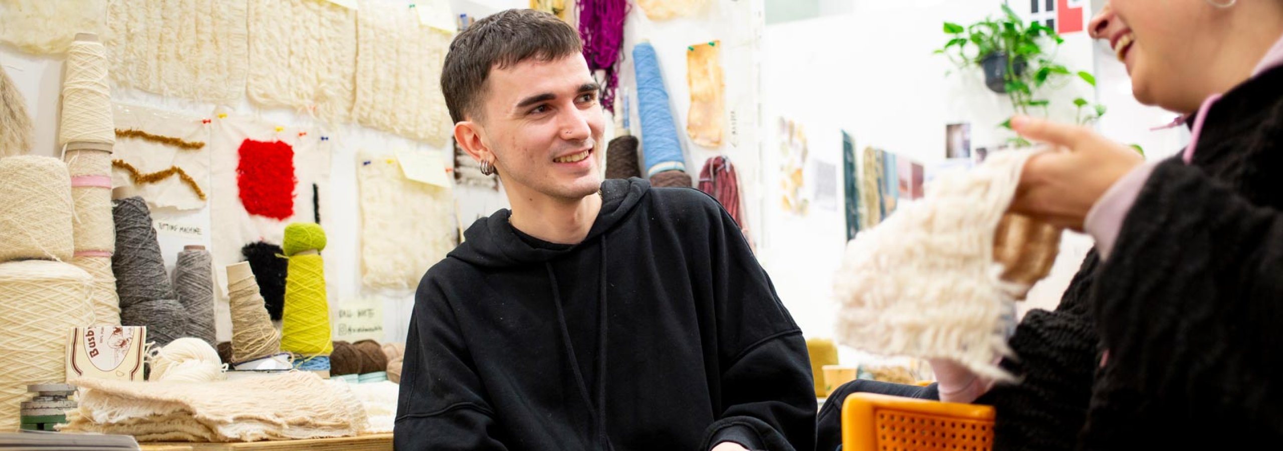 Two Textile Design students in a studio at Falmouth University