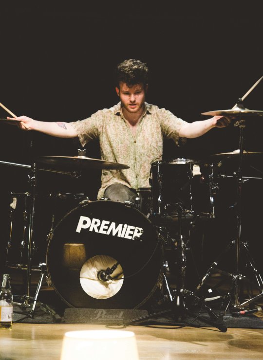 Popular music student playing drums
