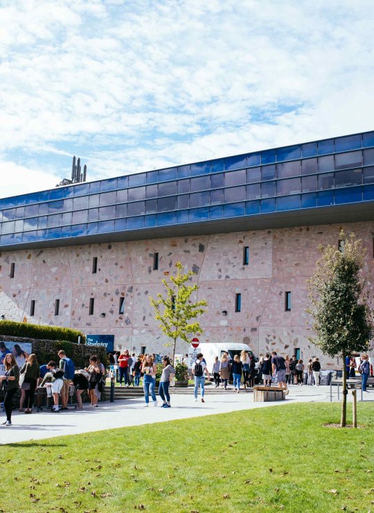 Students in a square on campus
