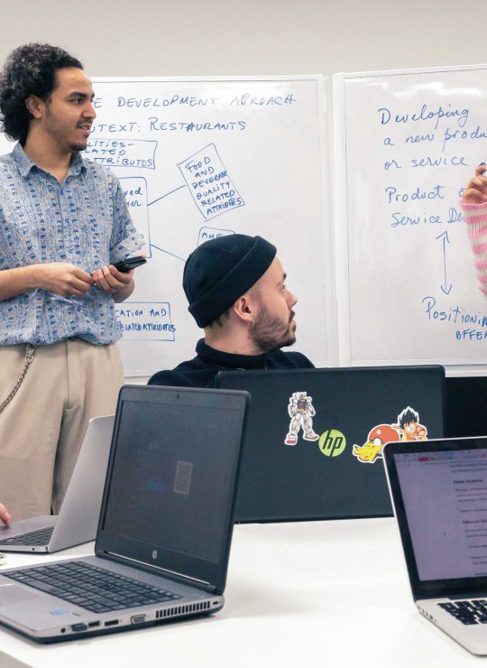 A group of people doing a presentation