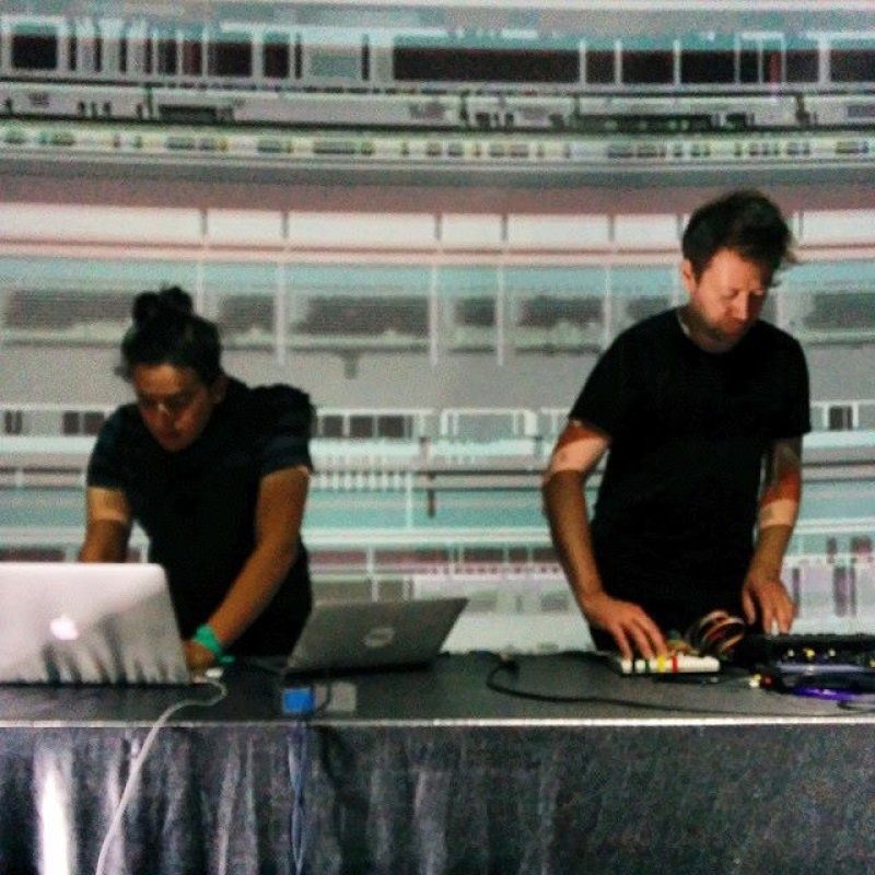 People with equipment at desk