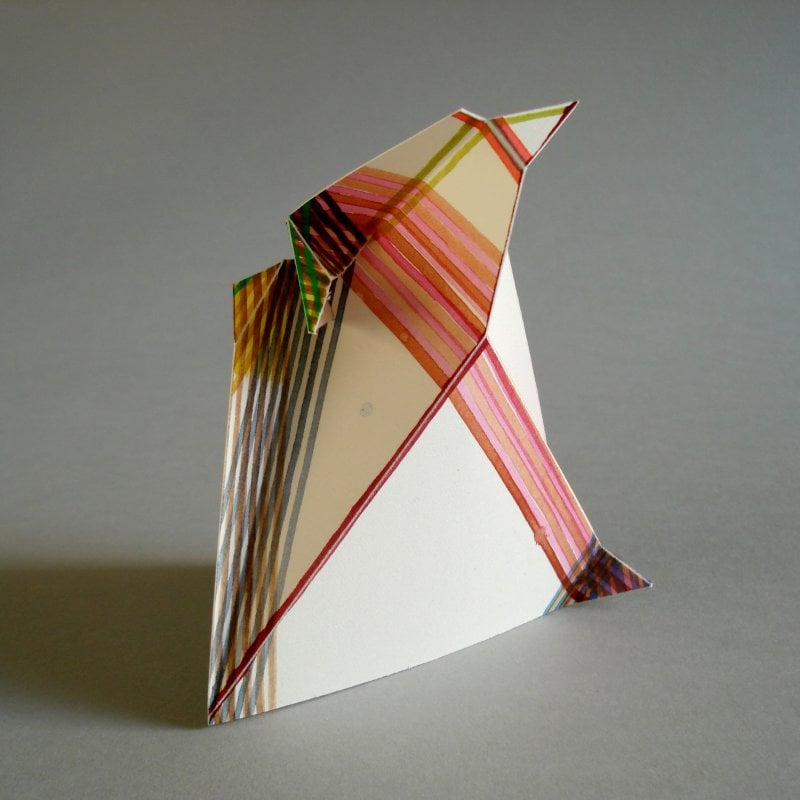 Folded paper with red lines