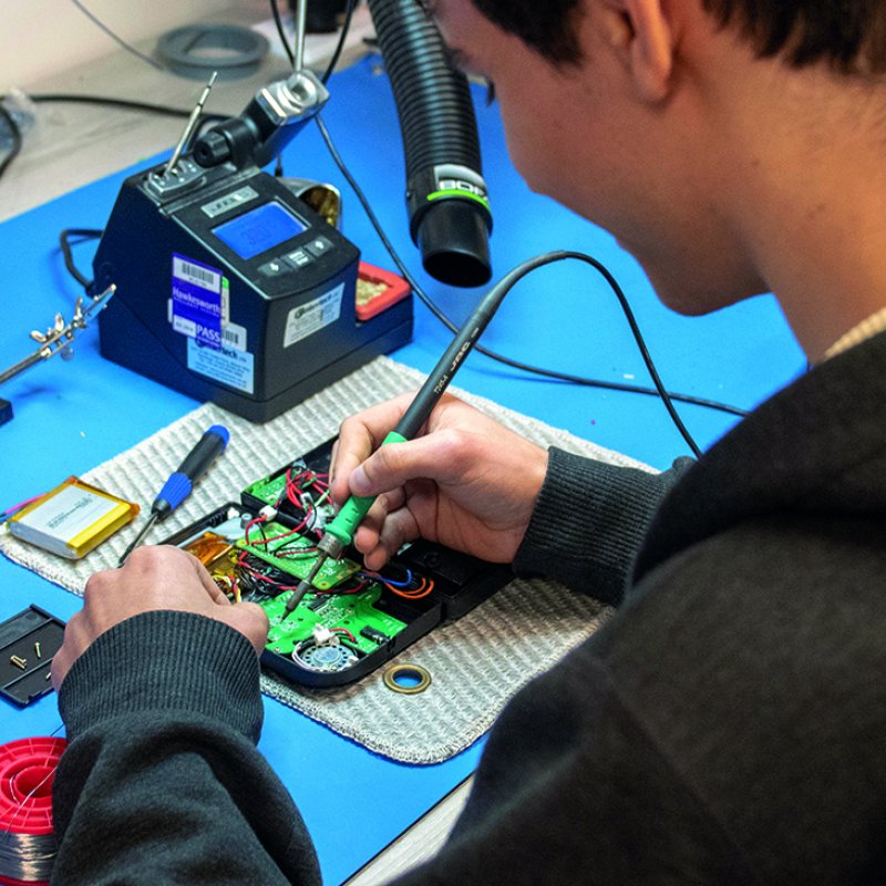 Creative Robotics student working in robotics lab. 