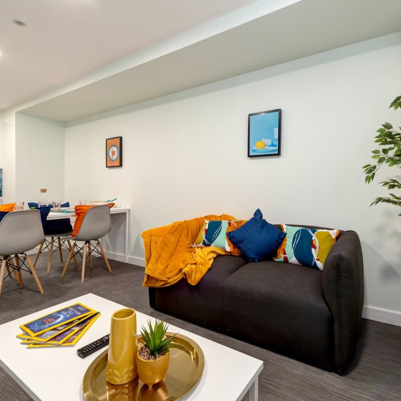 Coffee table and a grey sofa