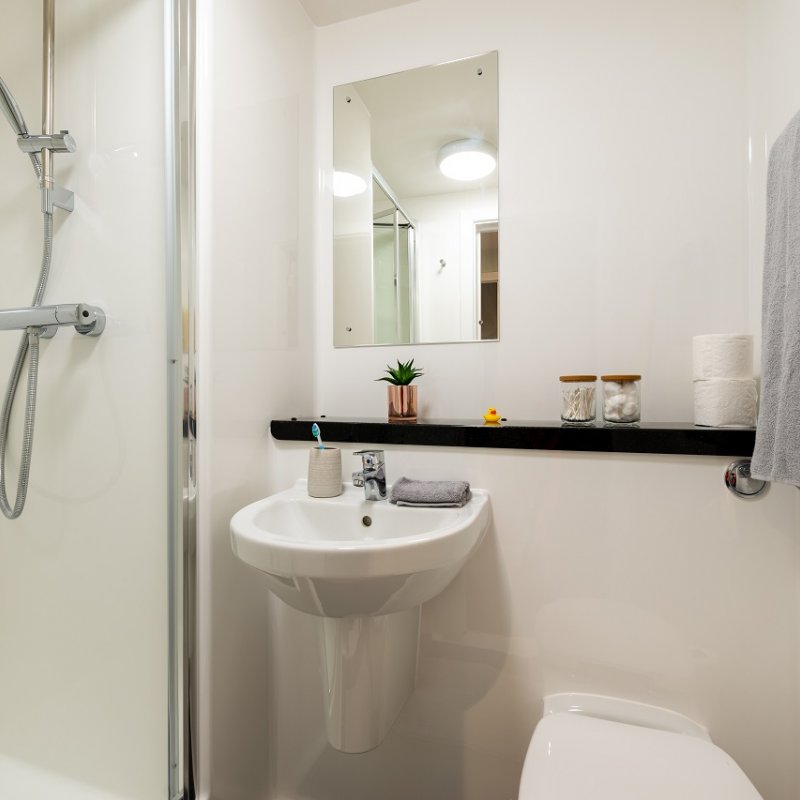 Bathroom interior with shower and sink