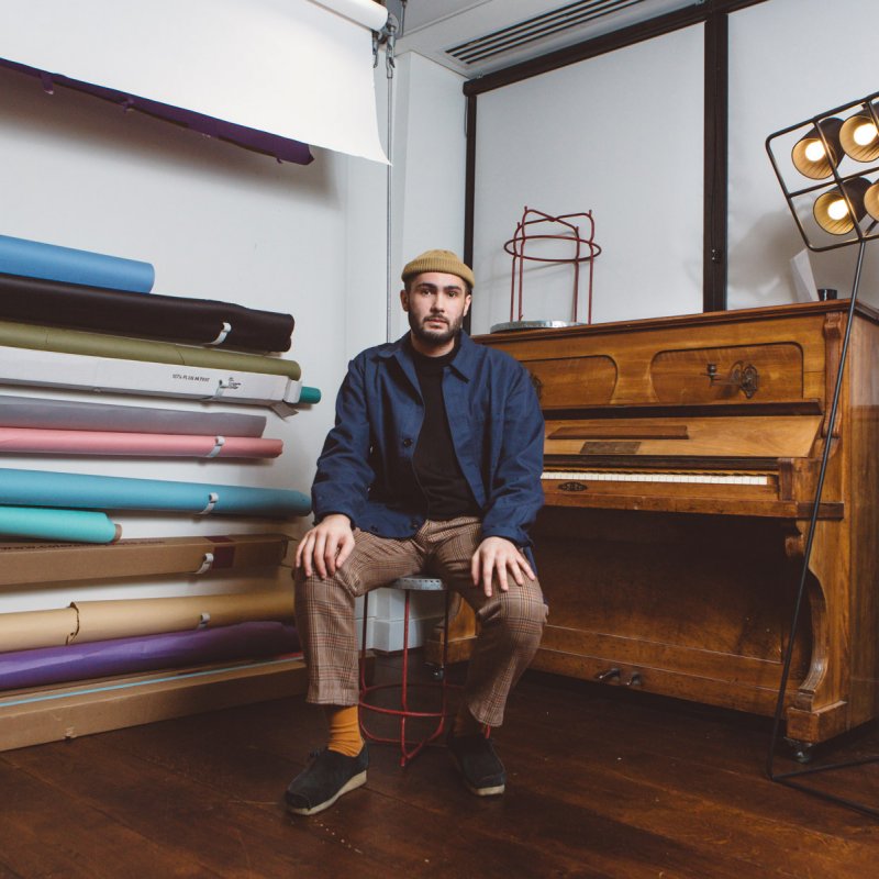 Photo of Dominic McKiernan sitting on a stool