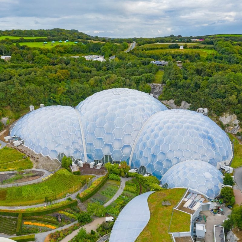 Aerial view of the Eden Project domes with fields and sky