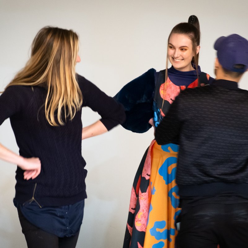 Stylists working with a model on the Fashion Design Lookbook shoot