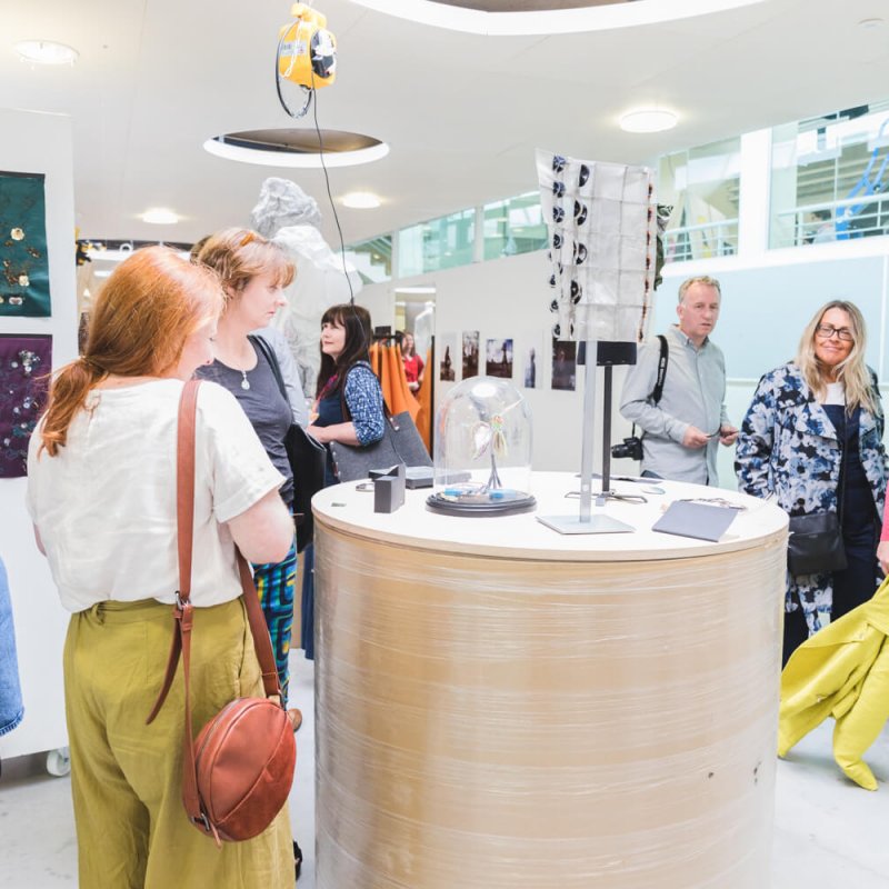 Guests looking at fashion exhibition at the summer shows.