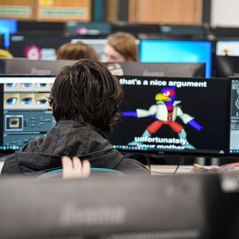 A student looking at a computer screen