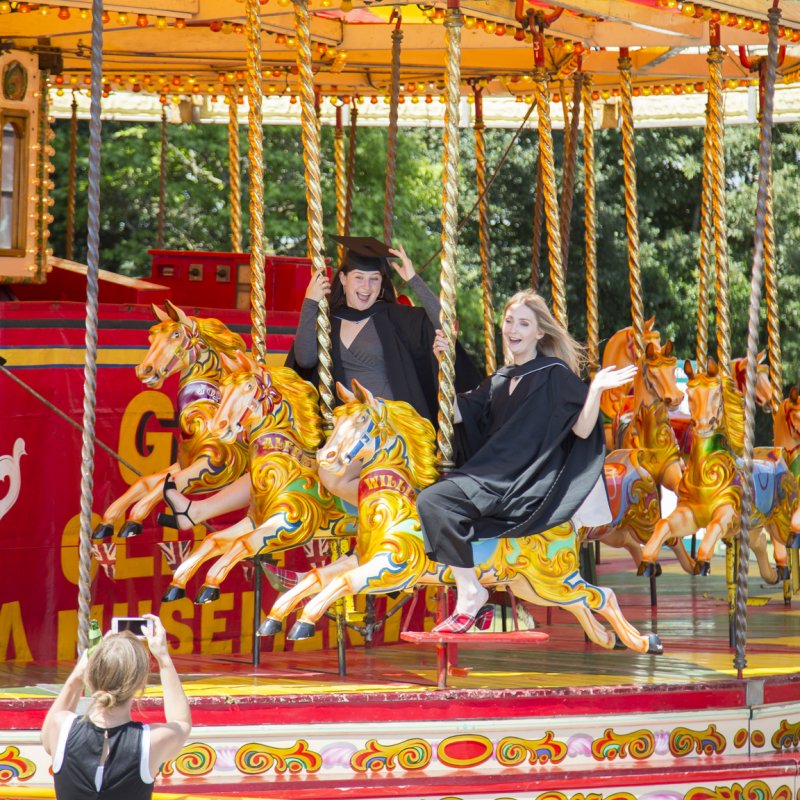 Students on the carousel