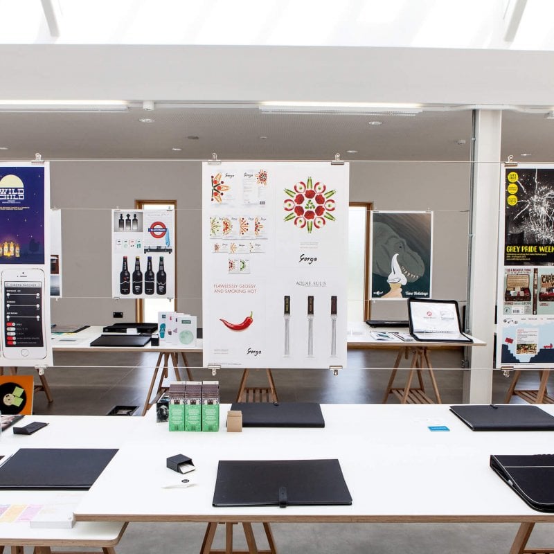 Graphic design work presentations suspended in studio at Falmouth University