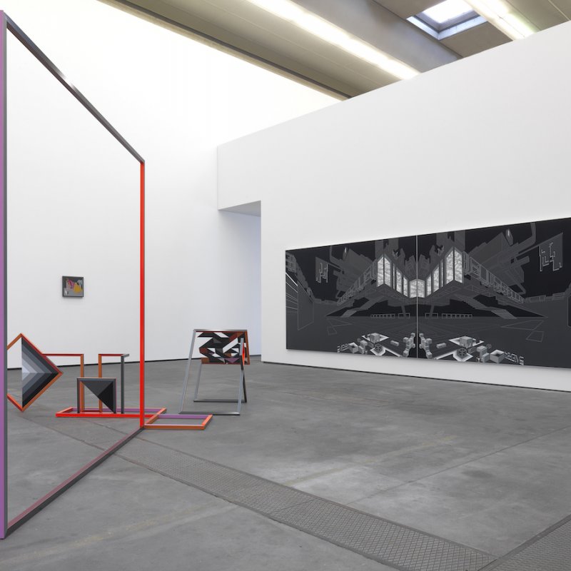 Photograph of a gallery space with a large grey canvas and a purple frame