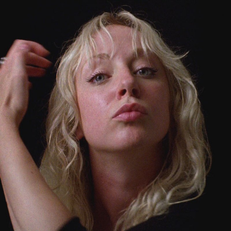 Female adjusting hair