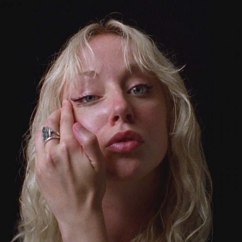 Female wiping eye