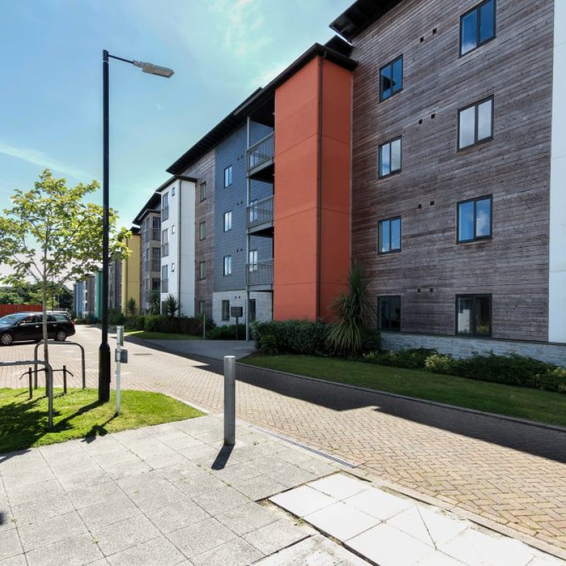 A block of student accommodation with a lamp