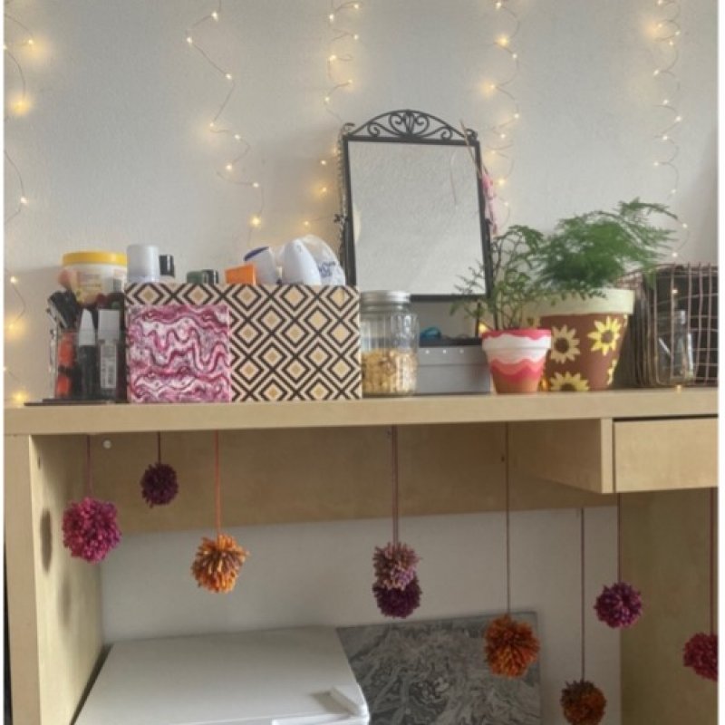 Decorated desk space in student bedroom 