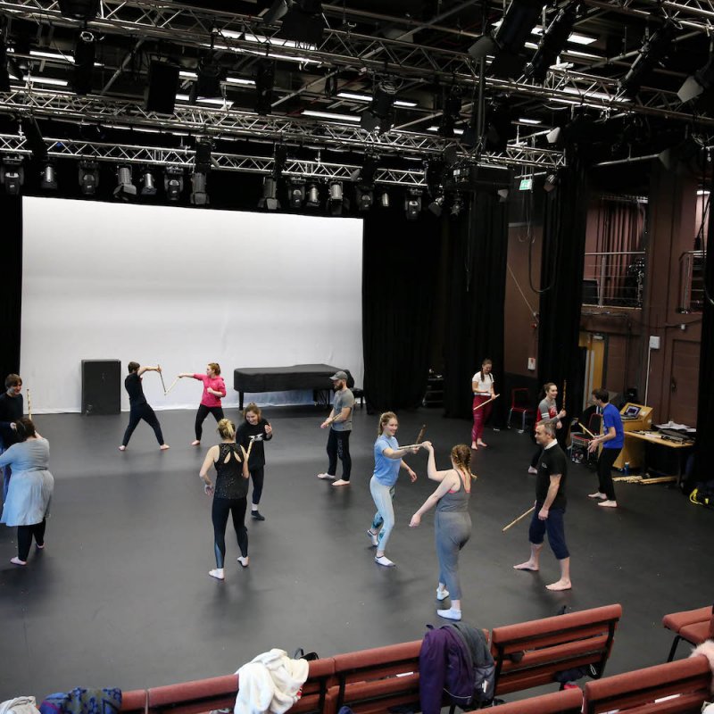 Students in a stage fighting workshop in AMATA studio
