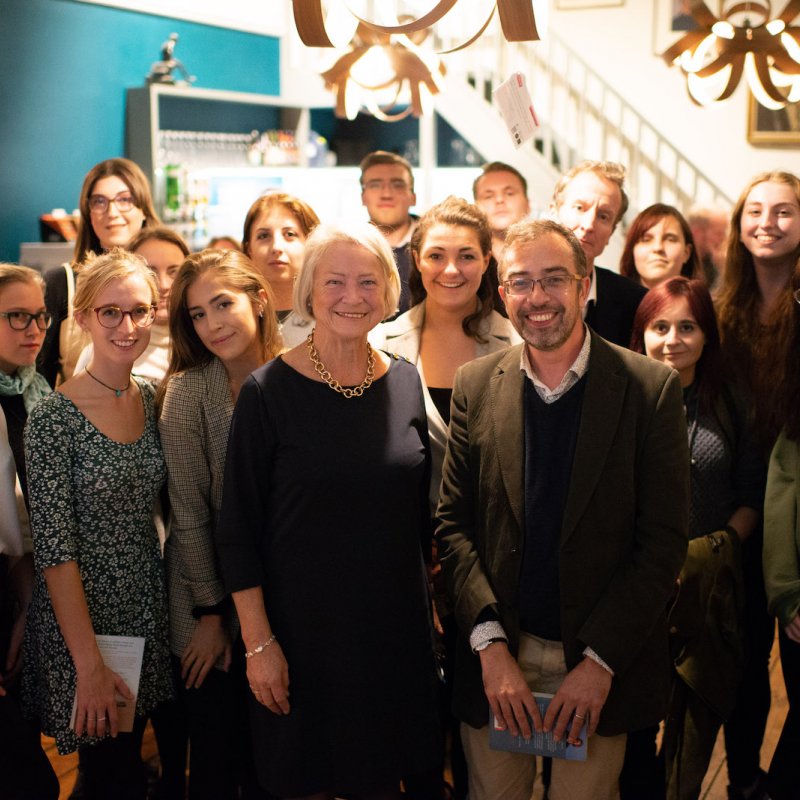 Kate Adie having photograph taken with a group of Falmouth University Journalism students.