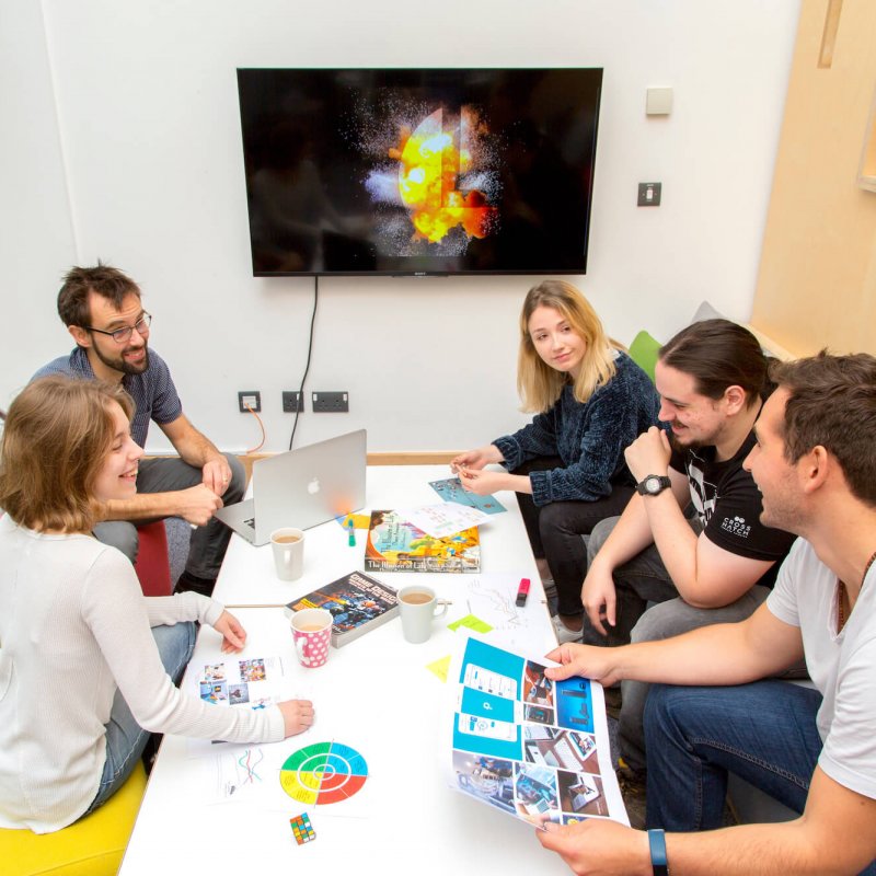 Students sat on brightly coloured cushions during an ideas session