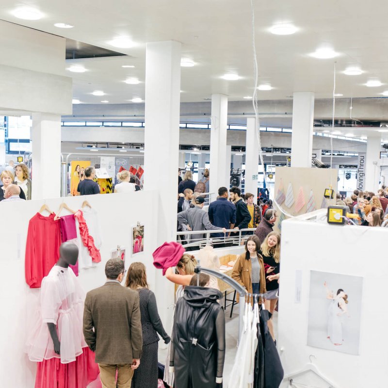 Guests looking at fashion exhibition at the summer shows.