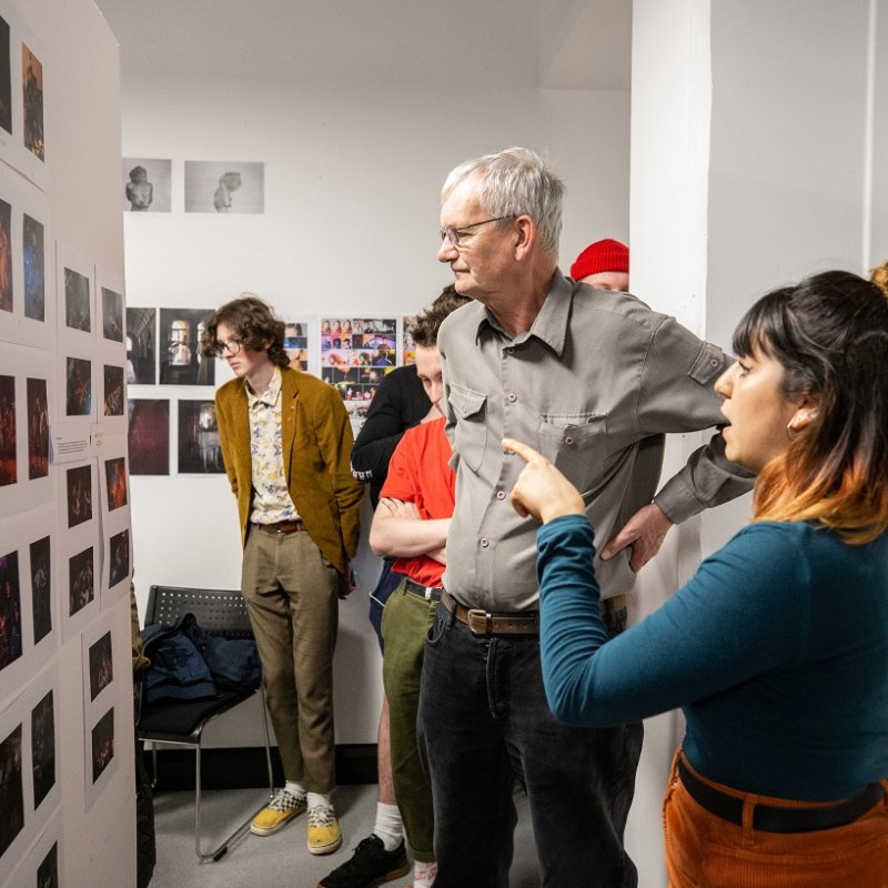 Martin Parr looking at student work