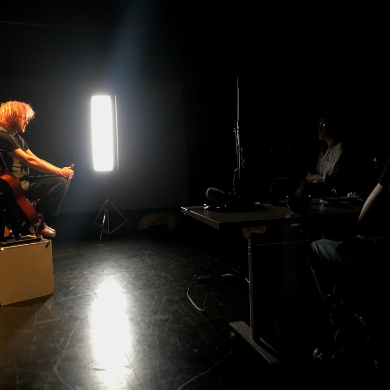 student on stage being interviewed
