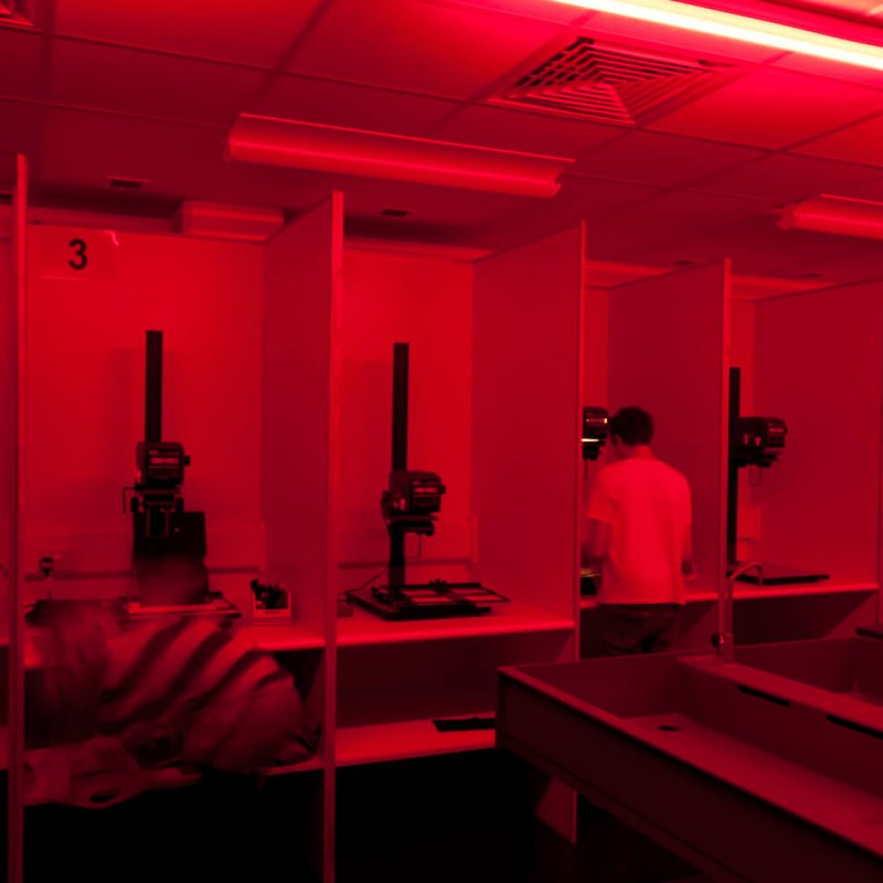 Red lit photography darkroom.