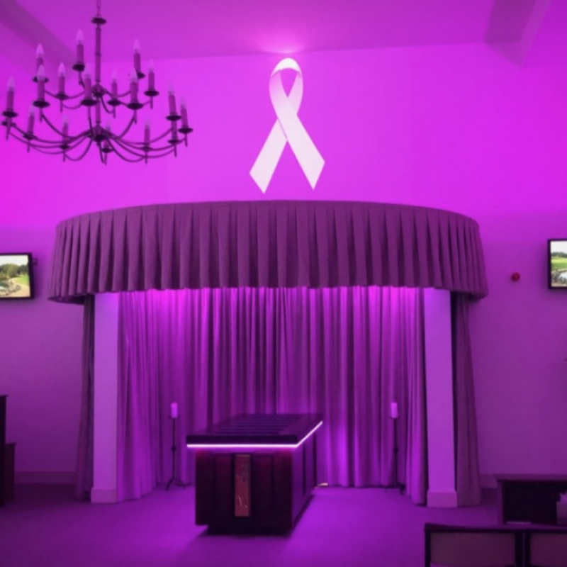 Crematorium illuminated in pink