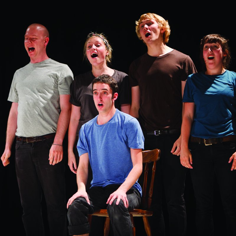 Group of students singing.