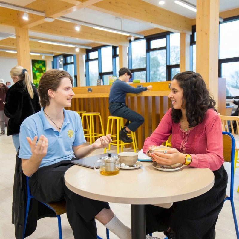 Students chatting in the sustainability cafe