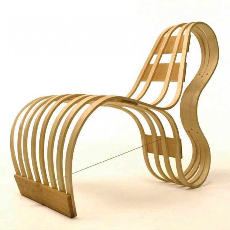 Steam bent wood curved lounger chair by Tom Raffield