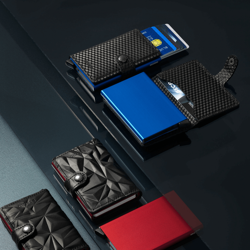 Leather wallets with blue and red cards