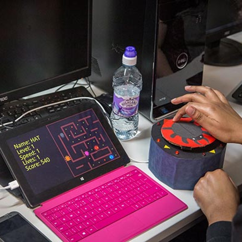 Falmouth University student using a cylindrical touch controller
