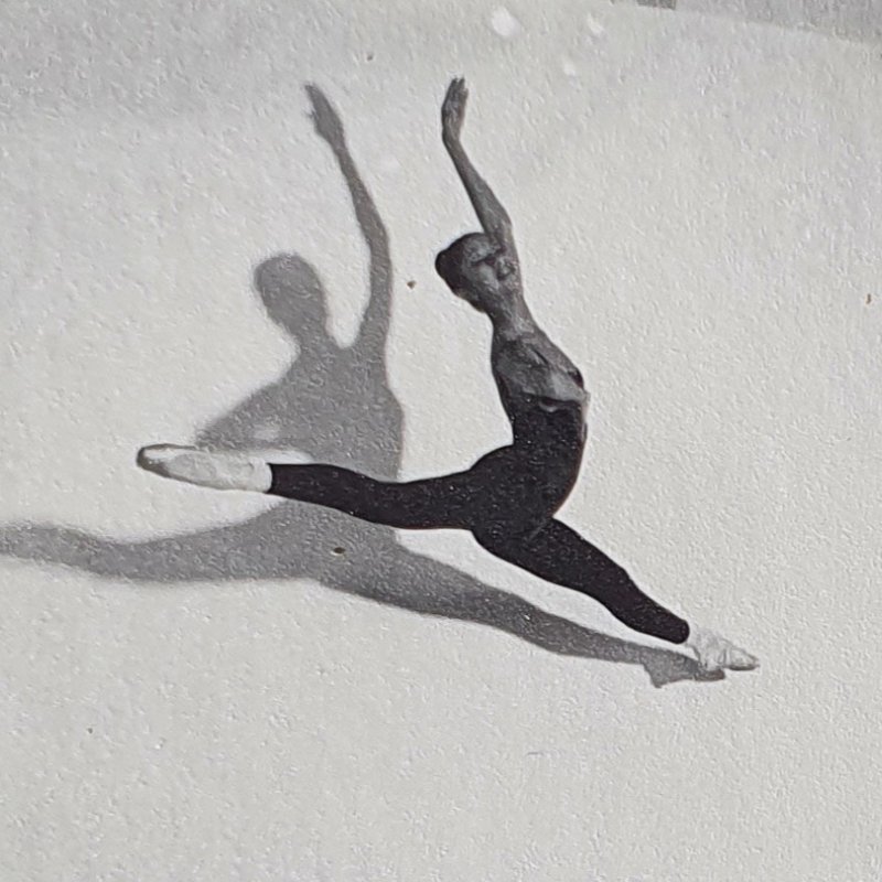 Julie Felix ballerina jumping in the air