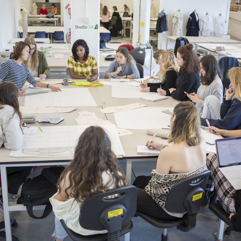 Fashion & Textiles students listening to academic staff