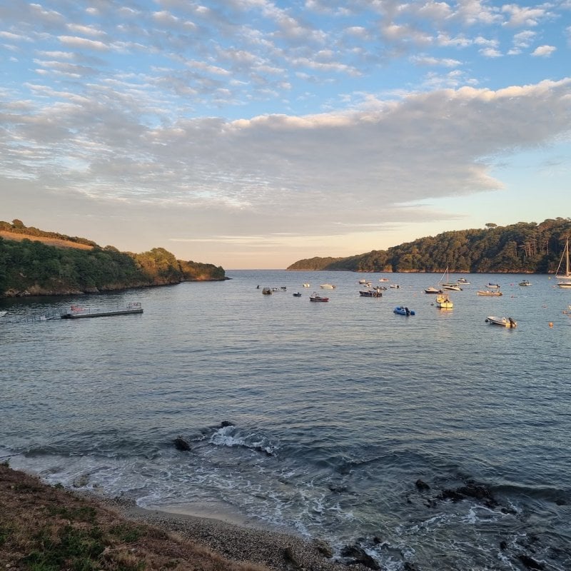 View of the Helford River with boats on the water