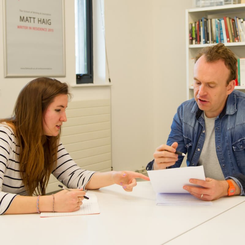 Matt Haig discussing work with a Falmouth University writing student