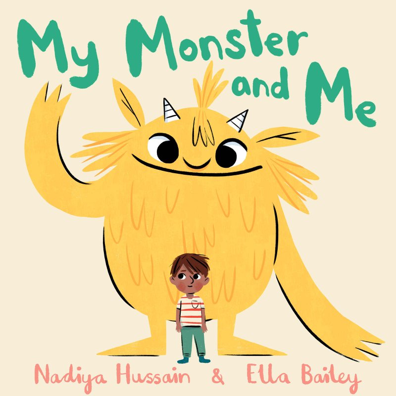 Book cover of a small boy standing in front of a large yellow monster