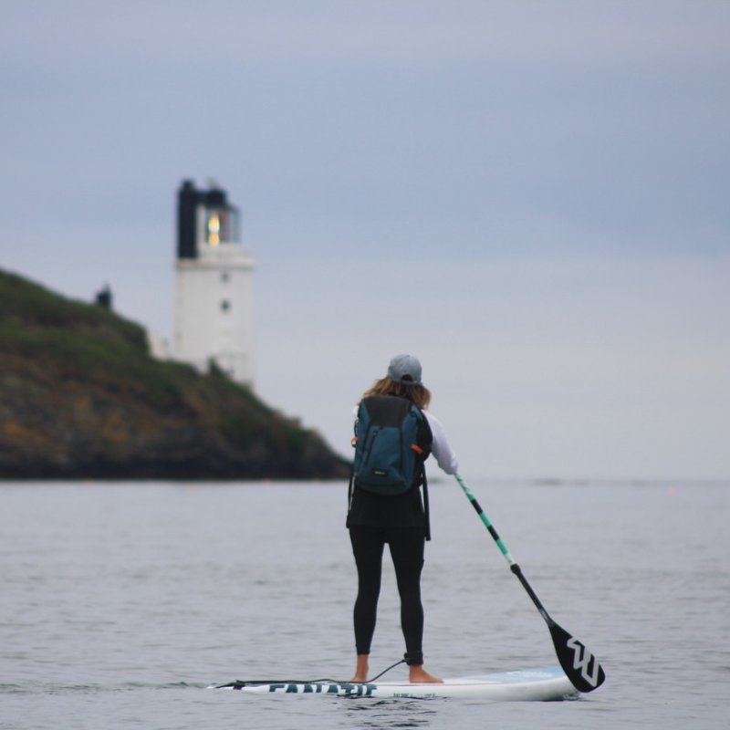 student paddleboarding