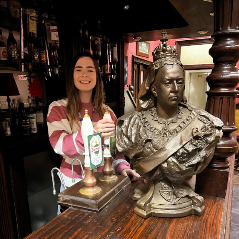 Tia Mullins behind bar at Queen Vic