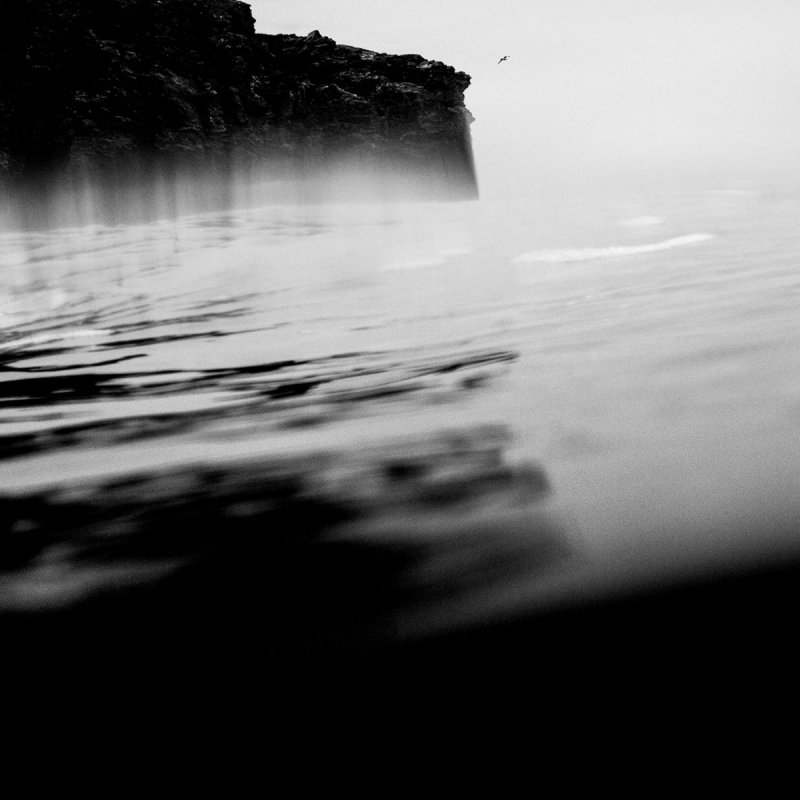 Black and white photograph of tin mine cliffs in Cornwall by Abbi Hughes