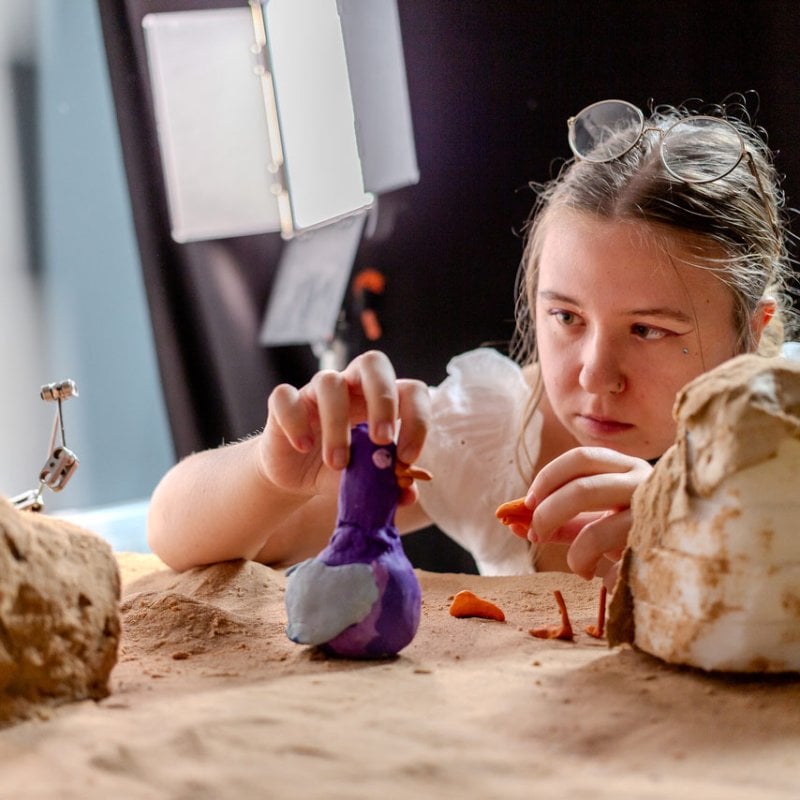 Falmouth University Animation student placing a 3d model of a bird